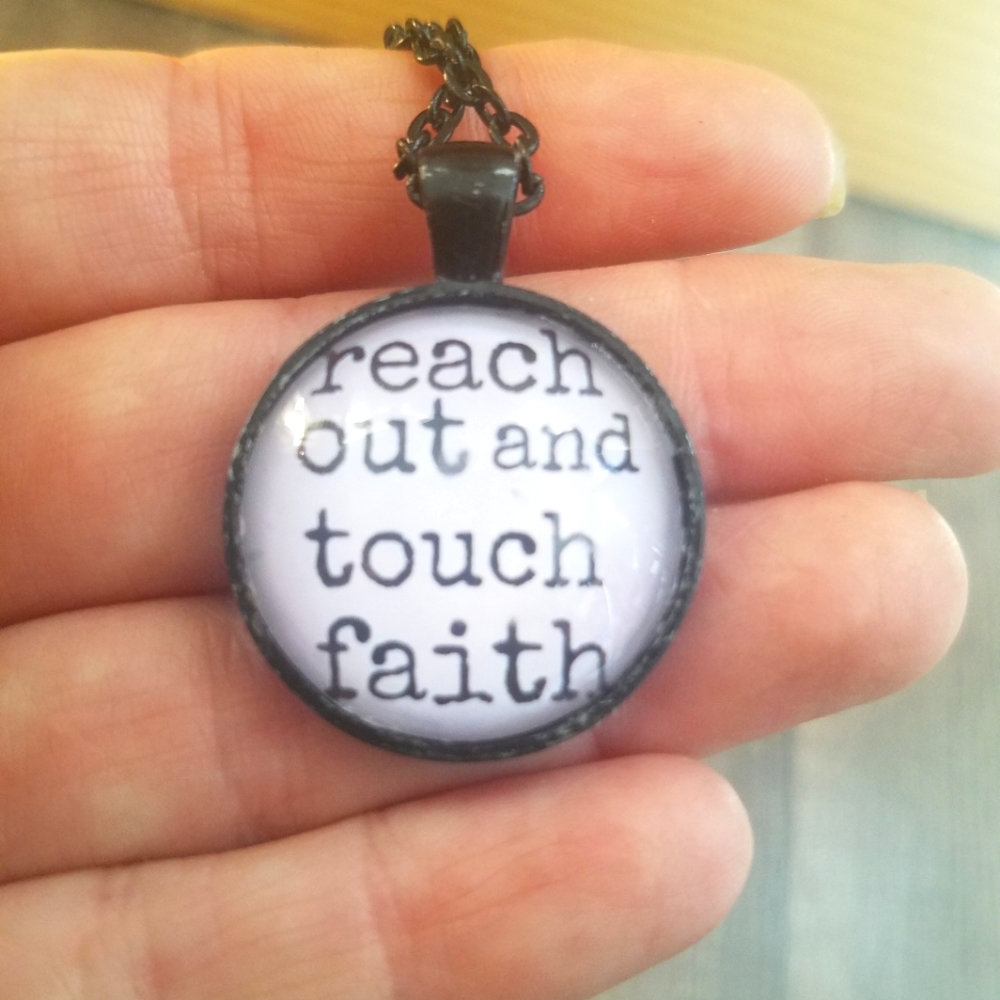 Reach out touch faith necklace